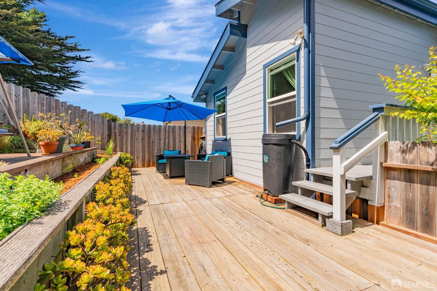 472 Copeland Street Pacifica, CA 94044 - Photo 27 of 31 a view of a balcony with chairs and potted plants