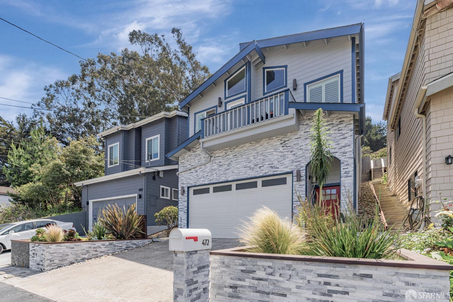 472 Copeland Street Pacifica, CA 94044 - Photo 3 of 31 a front view of a house with a yard and potted plants