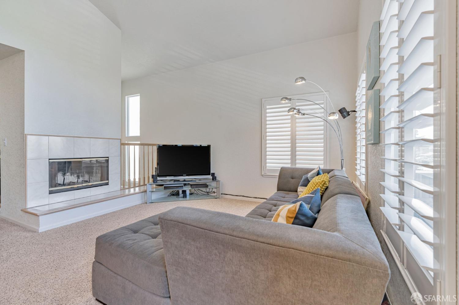 472 Copeland Street Pacifica, CA 94044 - Photo 5 of 31 a living room with furniture and a flat screen tv