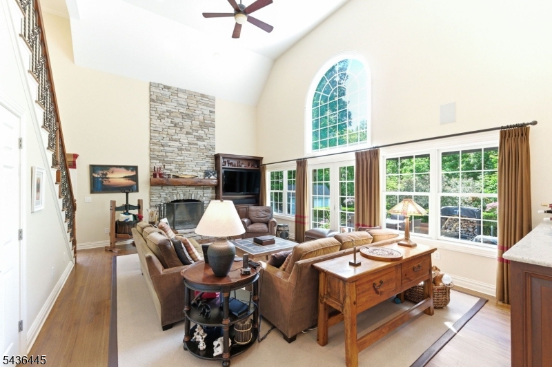 4 Windemere Way Sparta, NJ 07871 - Photo 18 of 50 a living room with fireplace furniture and a large window