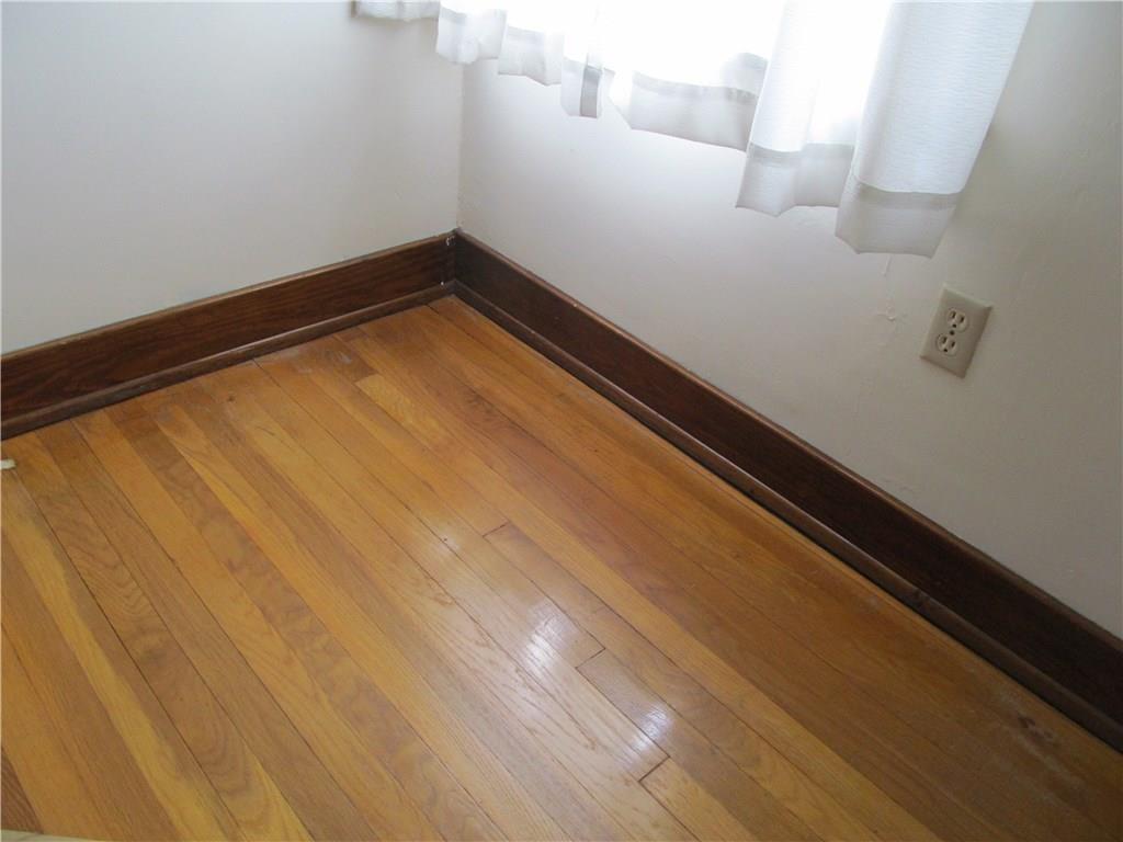 133 Ritzland Road Penn Hills, PA 15235 - Photo 19 of 23 Original hardwoods under carpets