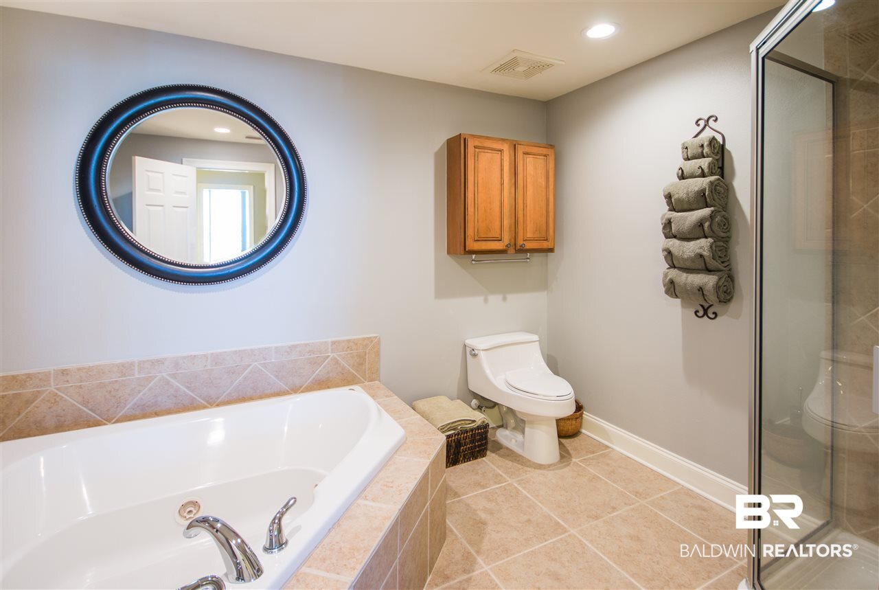 27800 Canal Road, Unit 216 Orange Beach, AL 36561 - Photo 27 of 34 Separate Tiled Shower & jetted Tub