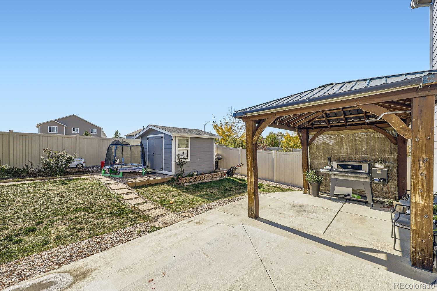 6808 Morrison Drive Frederick, CO 80530 - Photo 26 of 28 a house view with a outdoor space