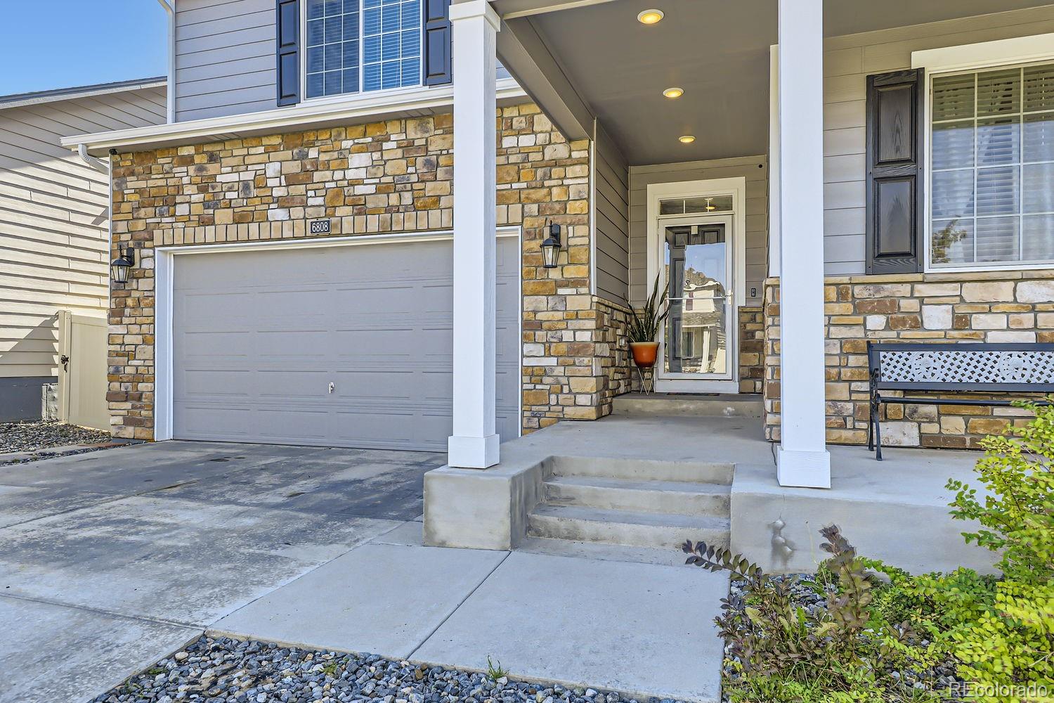 6808 Morrison Drive Frederick, CO 80530 - Photo 3 of 28 a view of entrance gate of the building