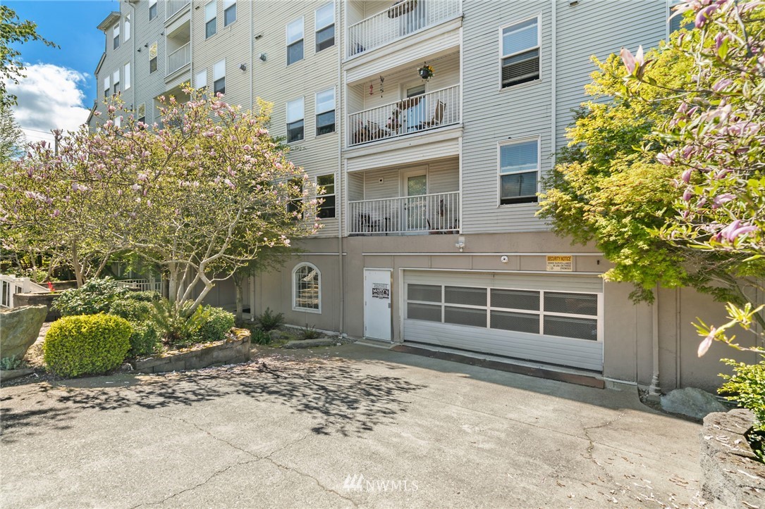 2522 Rucker Avenue, Unit 407 Everett, WA 98201 - Photo 30 of 30 a front view of a house with a garden