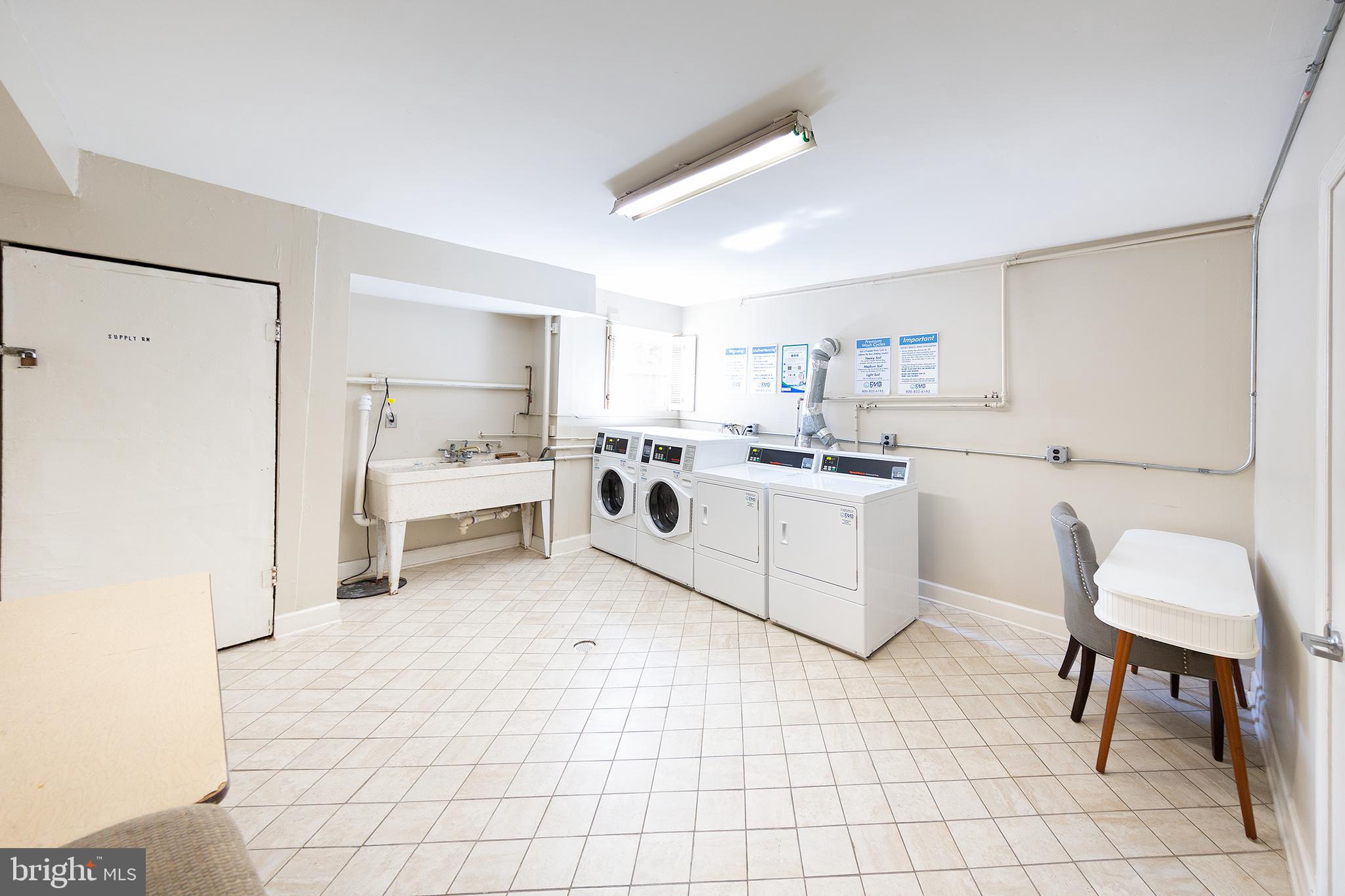 1706 U Street Northwest, Unit 104 Washington, DC 20009 - Photo 19 of 20 Laundry one flight down, shared bike storage too!