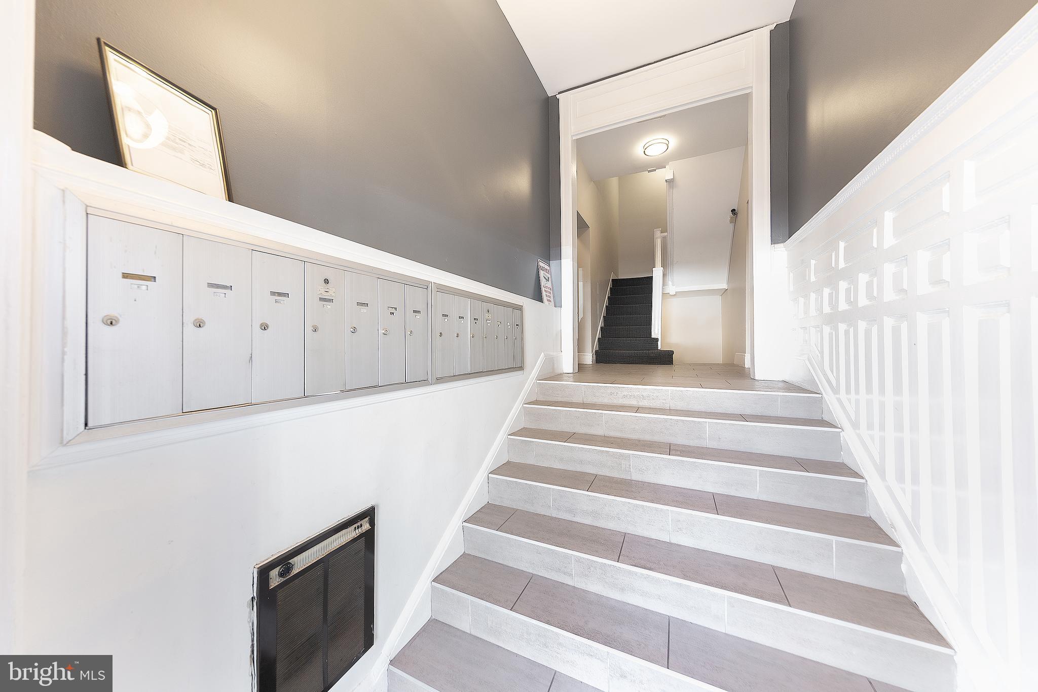 1706 U Street Northwest, Unit 104 Washington, DC 20009 - Photo 2 of 20 lobby area, up to the left for the condo