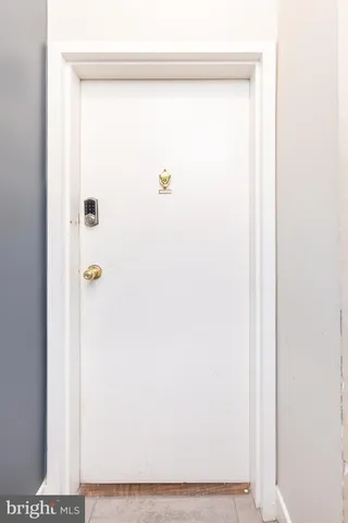 a view of a hallway with a glass door