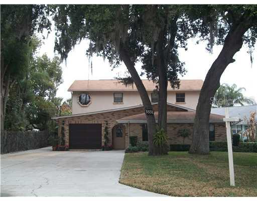 5531 Manatee Point Drive New Port Richey, FL 34652 - Photo 1 of 1 Exterior Front - Tranquil Waterfront Masterpiece