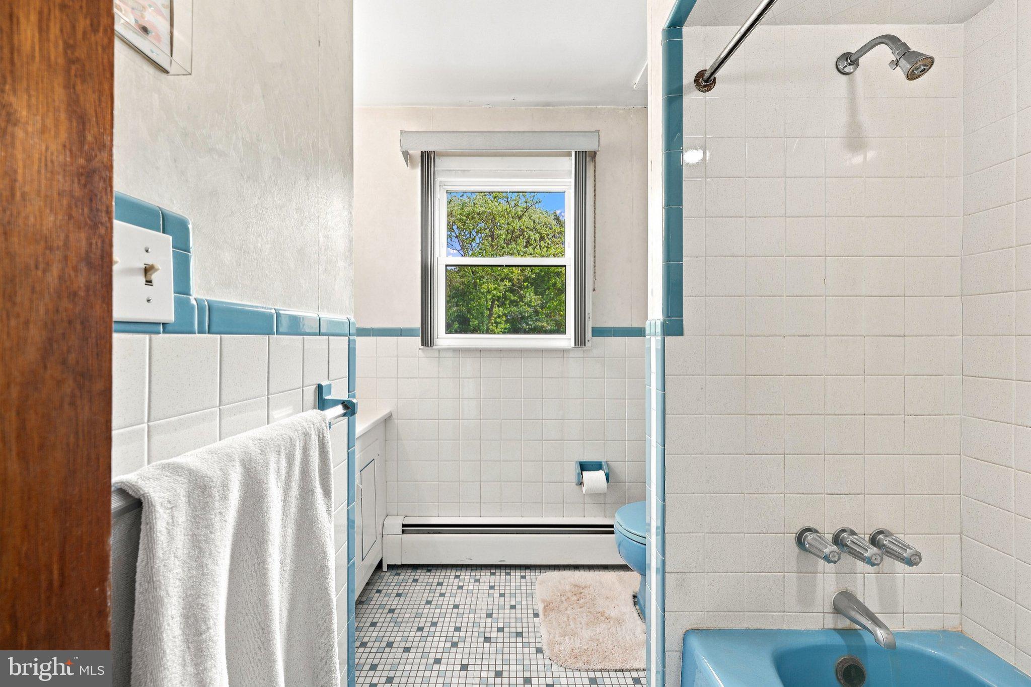 116 East Ridgewood Avenue Absecon, NJ 08205 - Photo 35 of 49 Charming vintage bathroom with natural light.