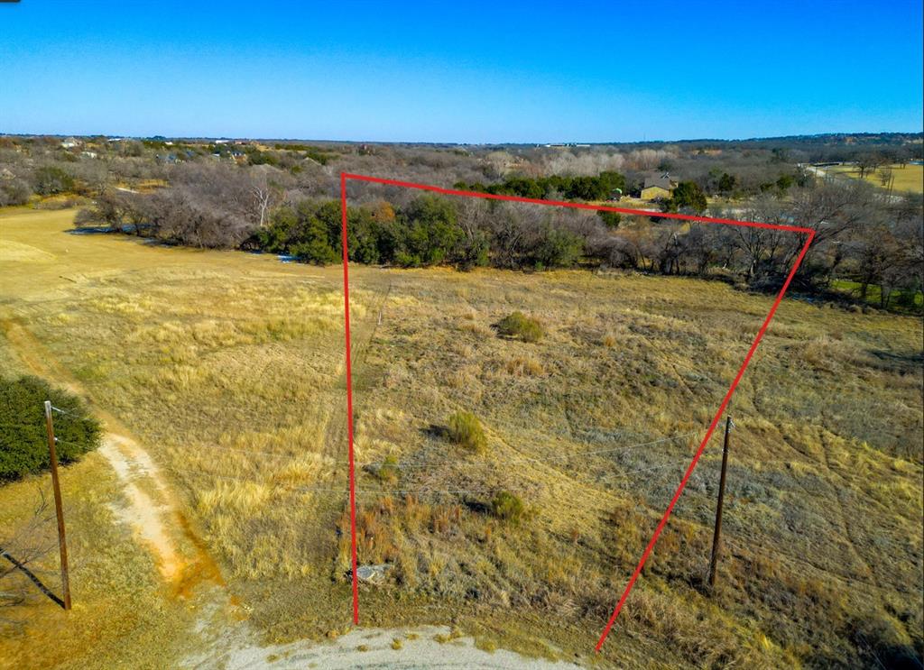 118 White Wing Court Weatherford, TX 76088 - Photo 2 of 8 a view of an outdoor space and a yard