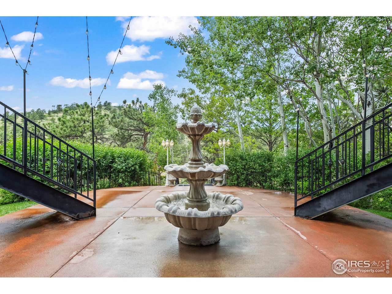 603 Indian Lookout Road Lyons, CO 80540 - Photo 28 of 39 a view of a table and chairs in patio with potted plants