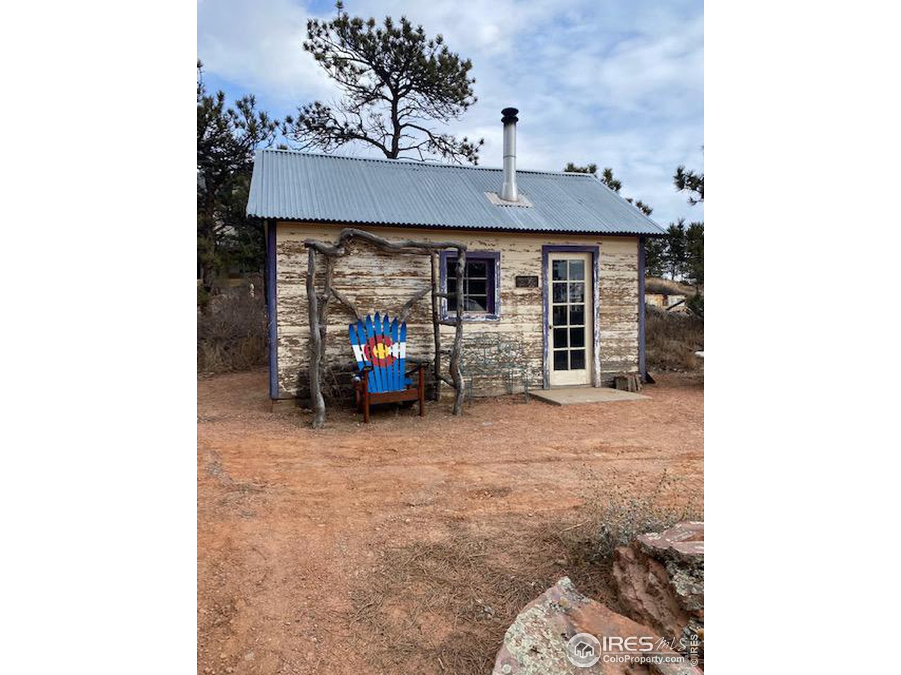 603 Indian Lookout Road Lyons, CO 80540 - Photo 29 of 39 a view of a room with a sink and a fireplace