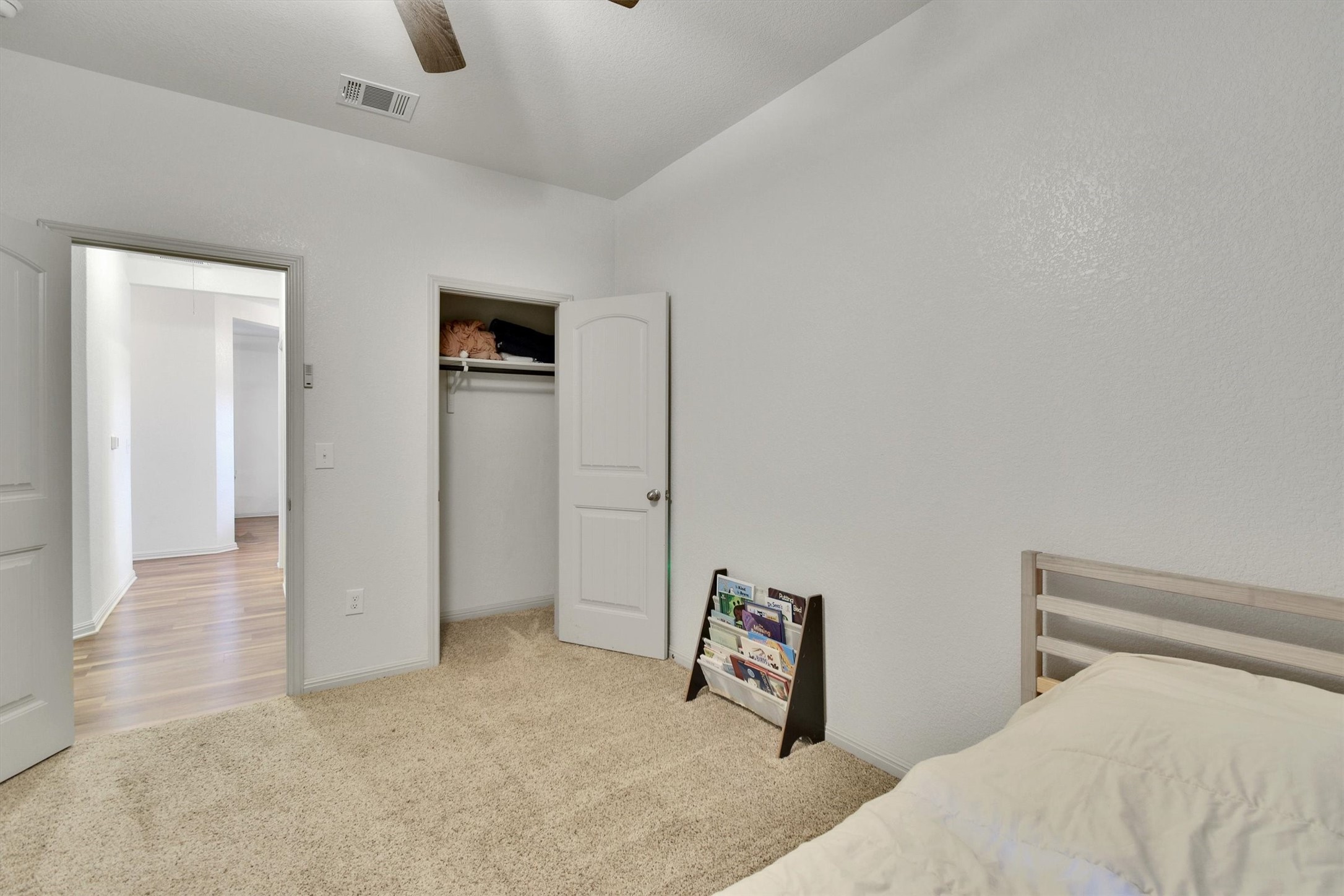 324 Shiner Lane Georgetown, TX 78626 - Photo 25 of 39 a bedroom with a bed and a window