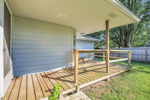 a view of deck with a backyard