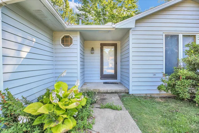 a view of a back yard of the house