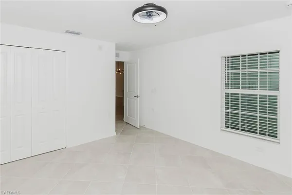 a view of livingroom with furniture and a window