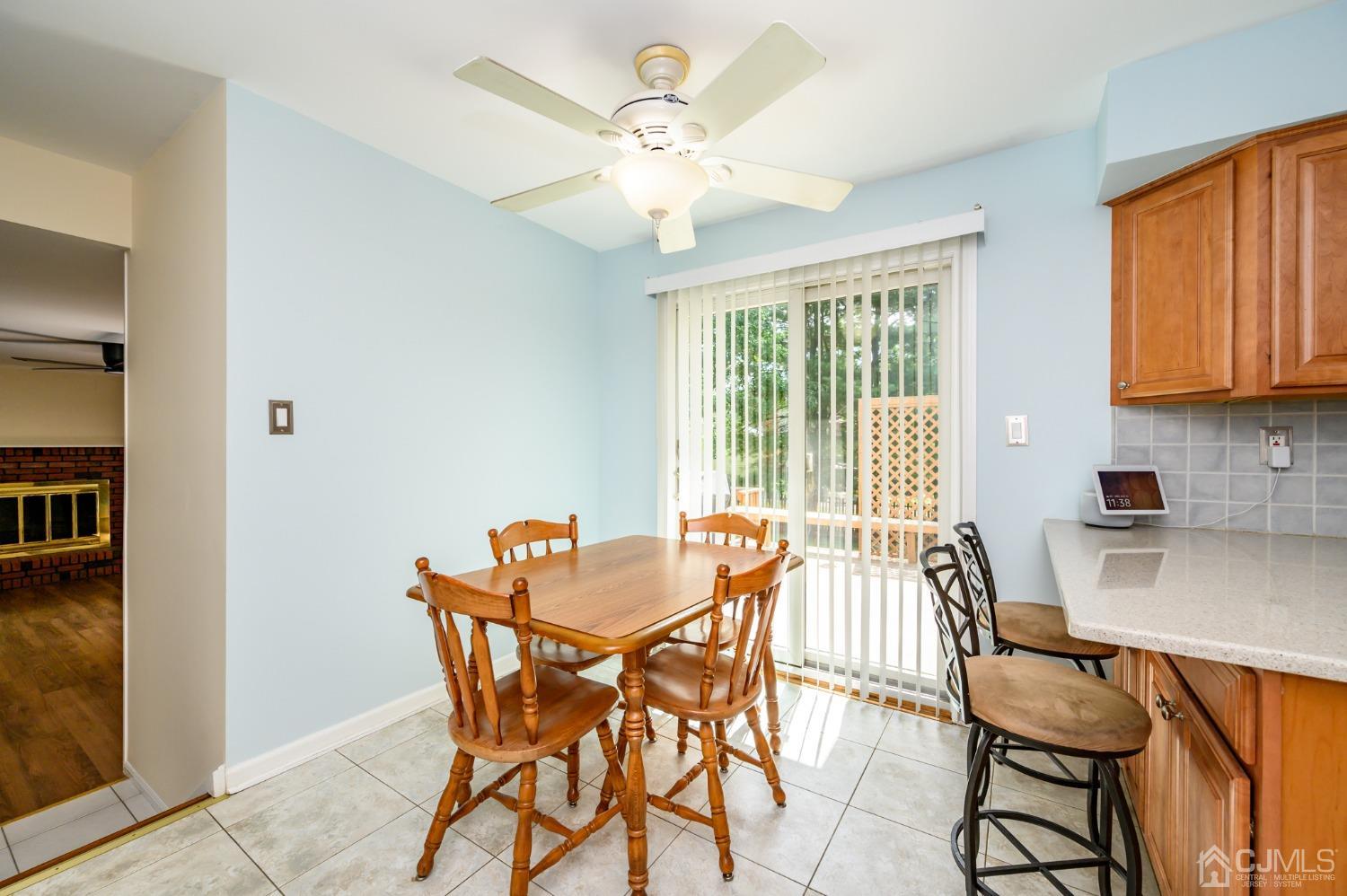 40 Fairfield Road Princeton, NJ 08540 - Photo 11 of 46 a view of a dining room with furniture and a chandelier