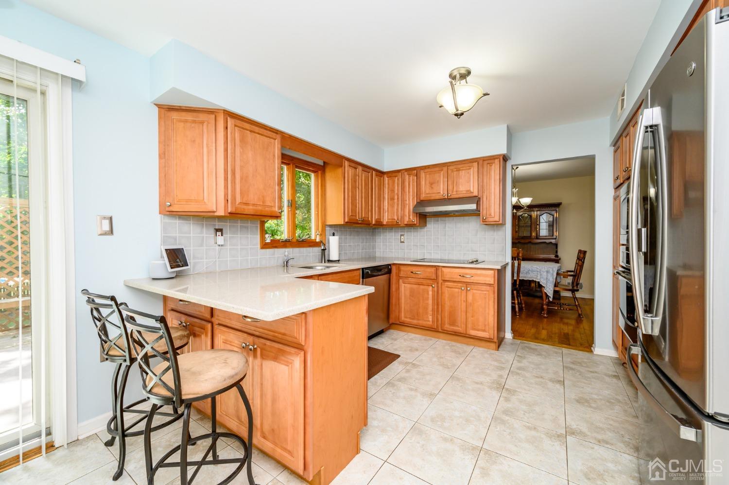 40 Fairfield Road Princeton, NJ 08540 - Photo 12 of 46 a kitchen with a stove a sink and a refrigerator
