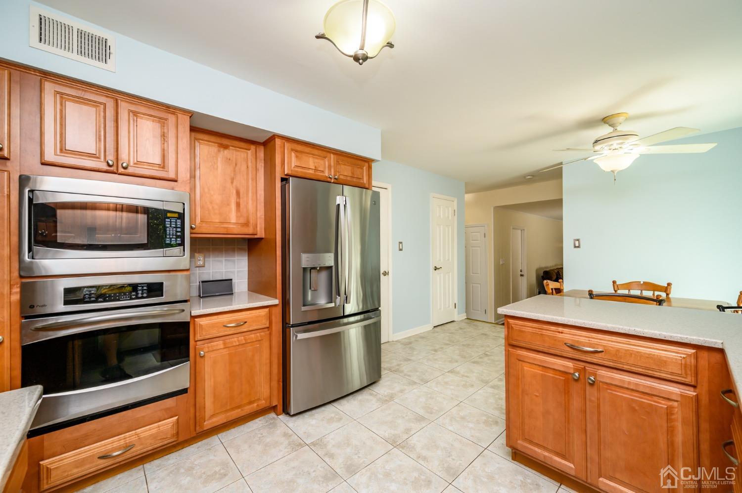 40 Fairfield Road Princeton, NJ 08540 - Photo 14 of 46 a kitchen with stainless steel appliances granite countertop a refrigerator a stove and a sink
