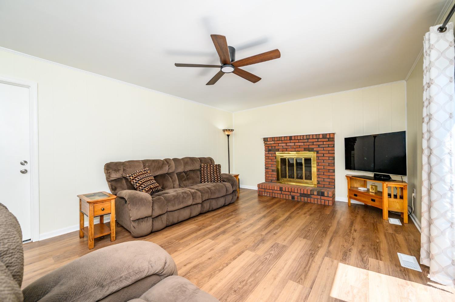 40 Fairfield Road Princeton, NJ 08540 - Photo 18 of 46 a living room with furniture flat screen tv and a fireplace