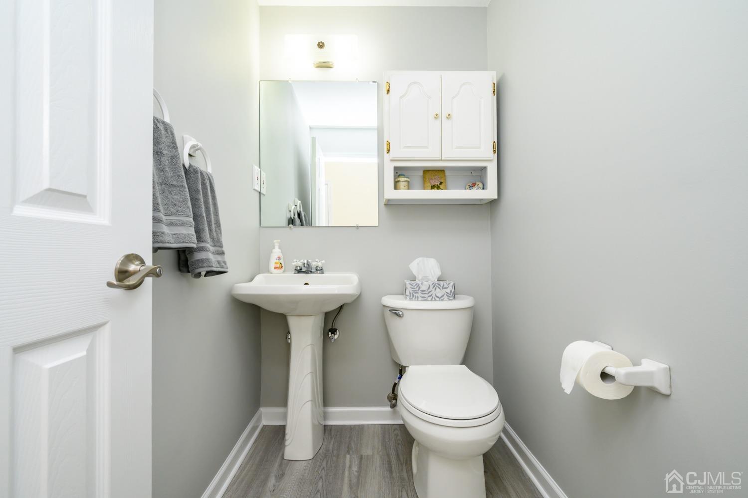 40 Fairfield Road Princeton, NJ 08540 - Photo 22 of 46 a bathroom with a toilet sink and mirror