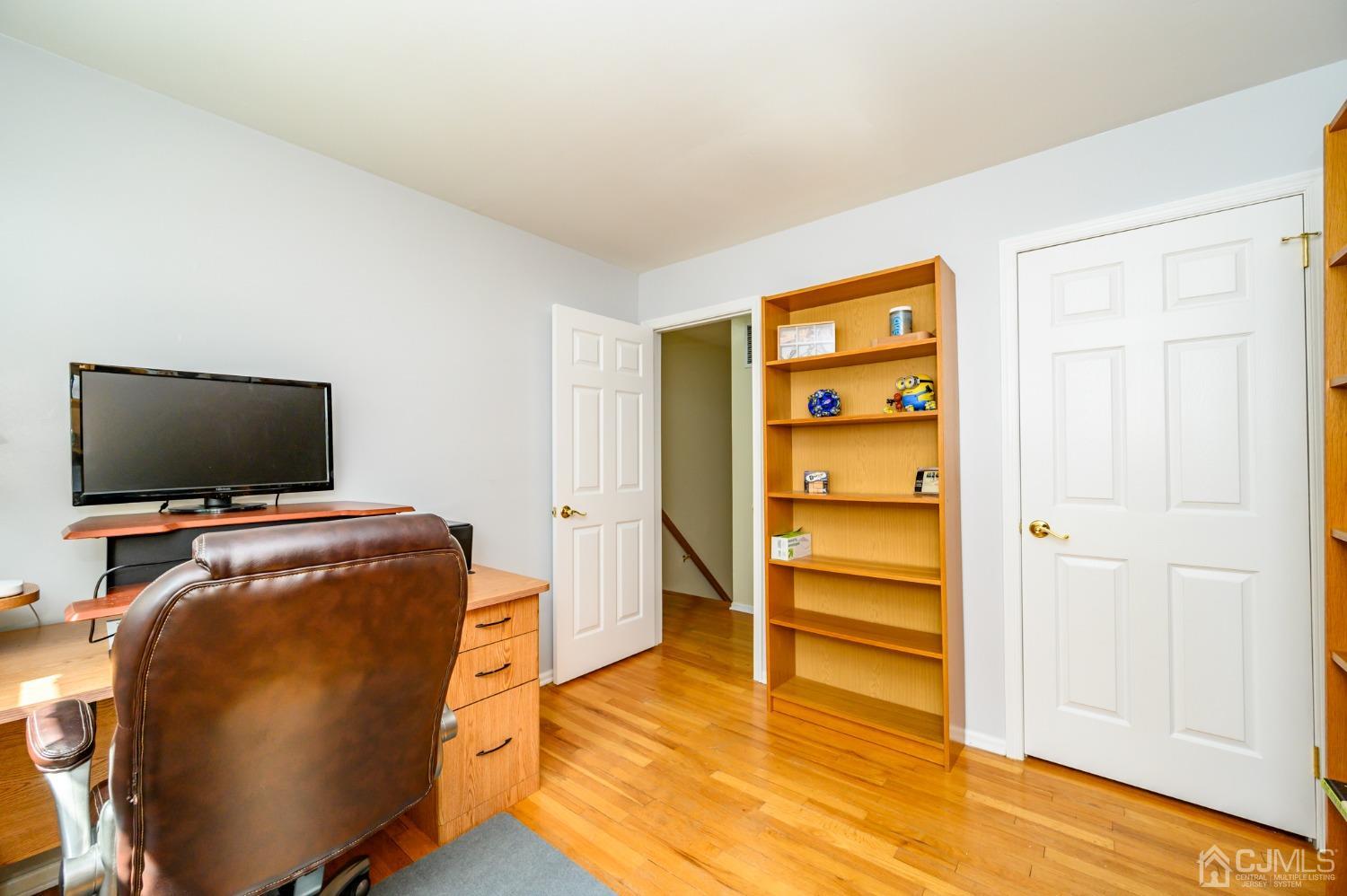 40 Fairfield Road Princeton, NJ 08540 - Photo 27 of 46 a bedroom with a bed and a flat screen tv
