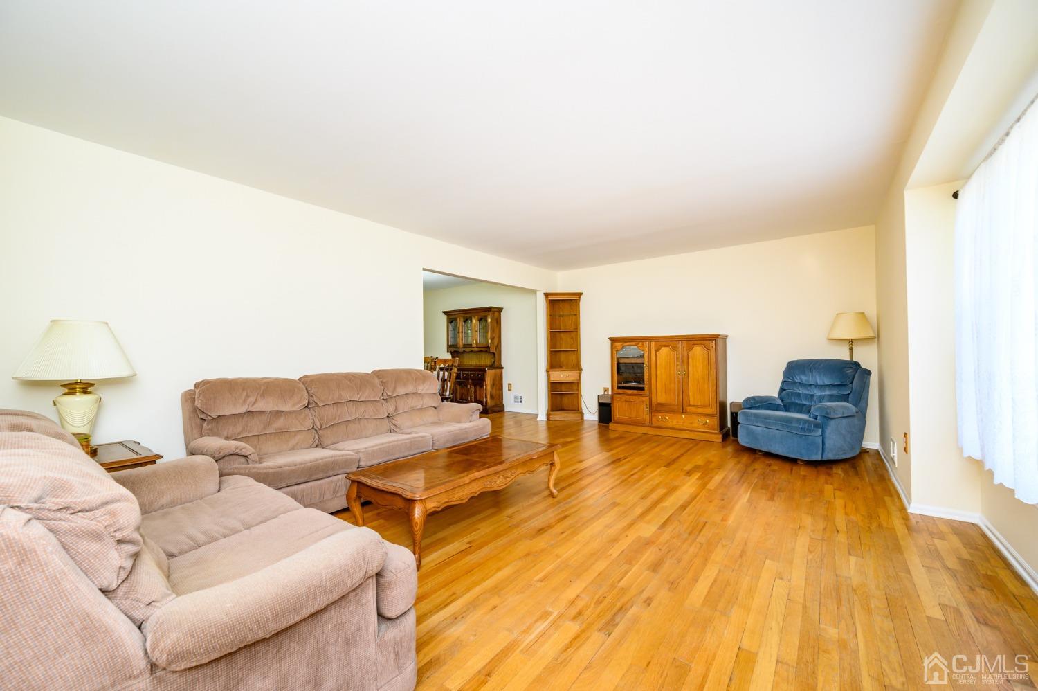 40 Fairfield Road Princeton, NJ 08540 - Photo 3 of 46 a bedroom with furniture and a wooden floor