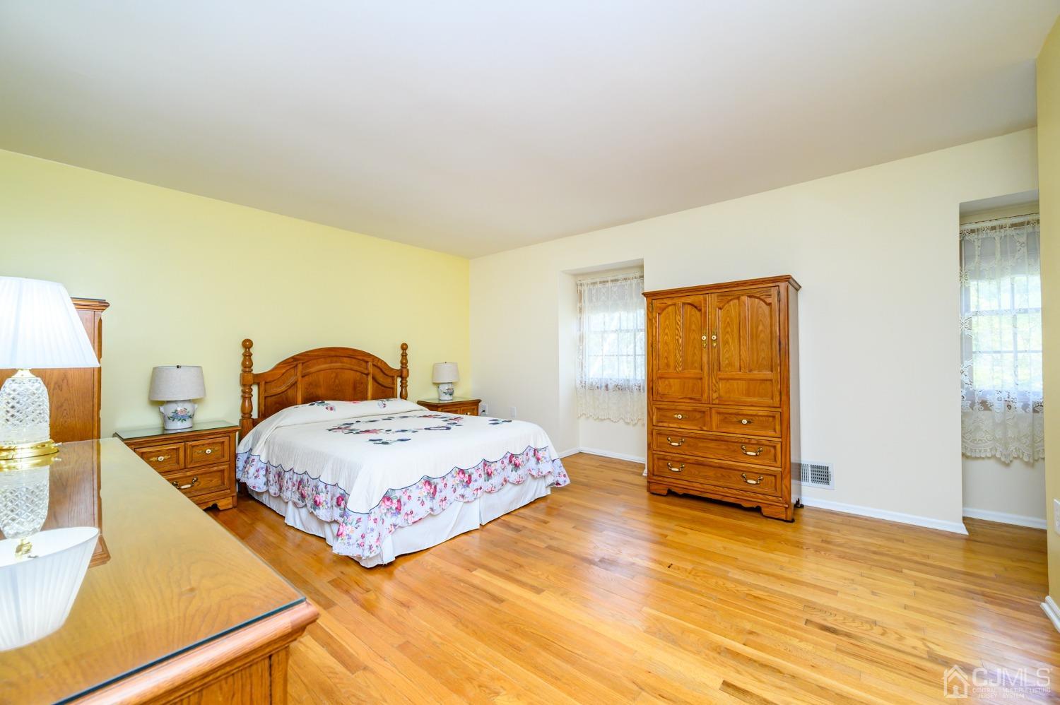 40 Fairfield Road Princeton, NJ 08540 - Photo 34 of 46 a bedroom with a bed and wooden floor