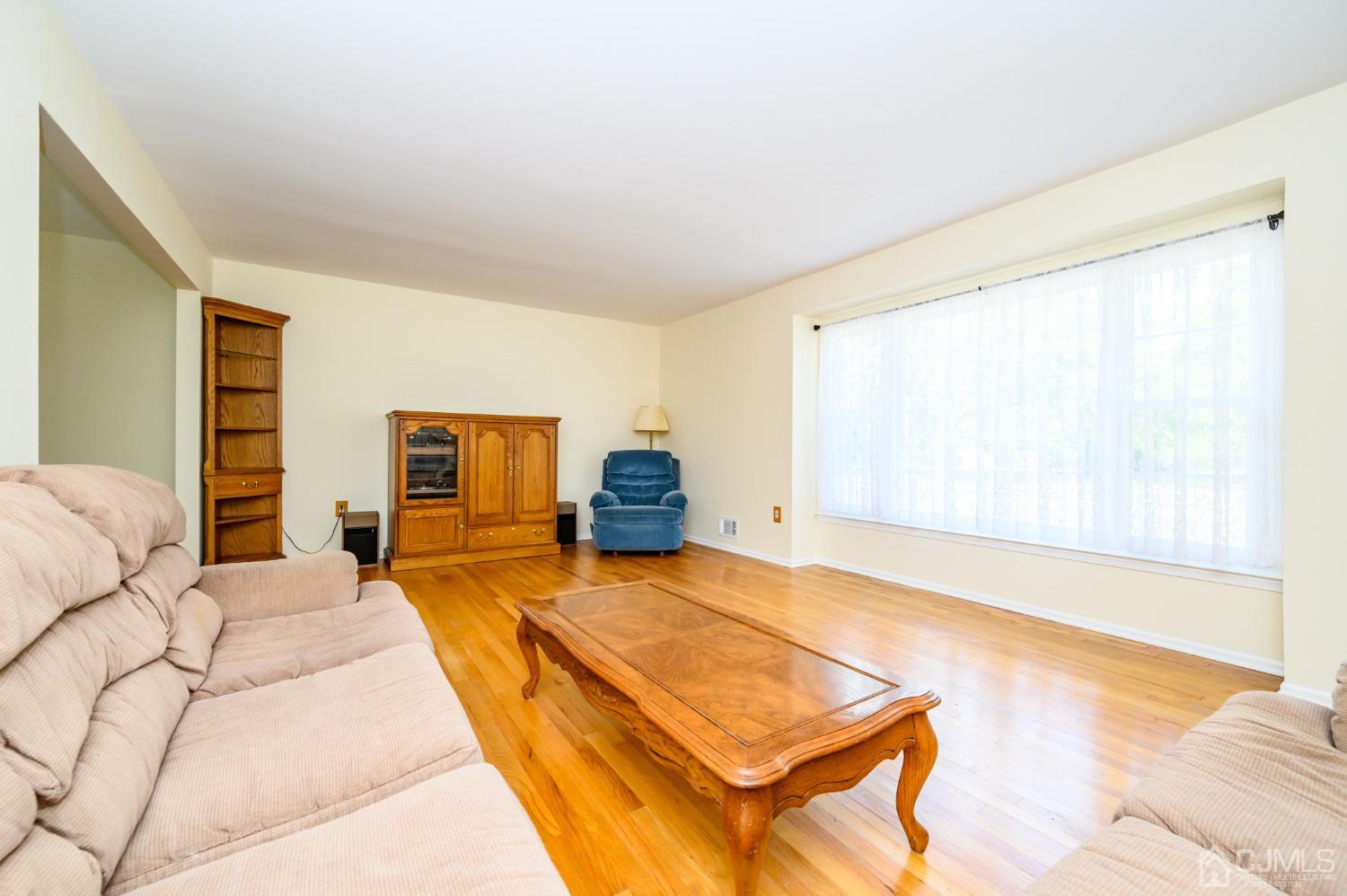 40 Fairfield Road Princeton, NJ 08540 - Photo 6 of 46 a bedroom with a bed and wooden floor