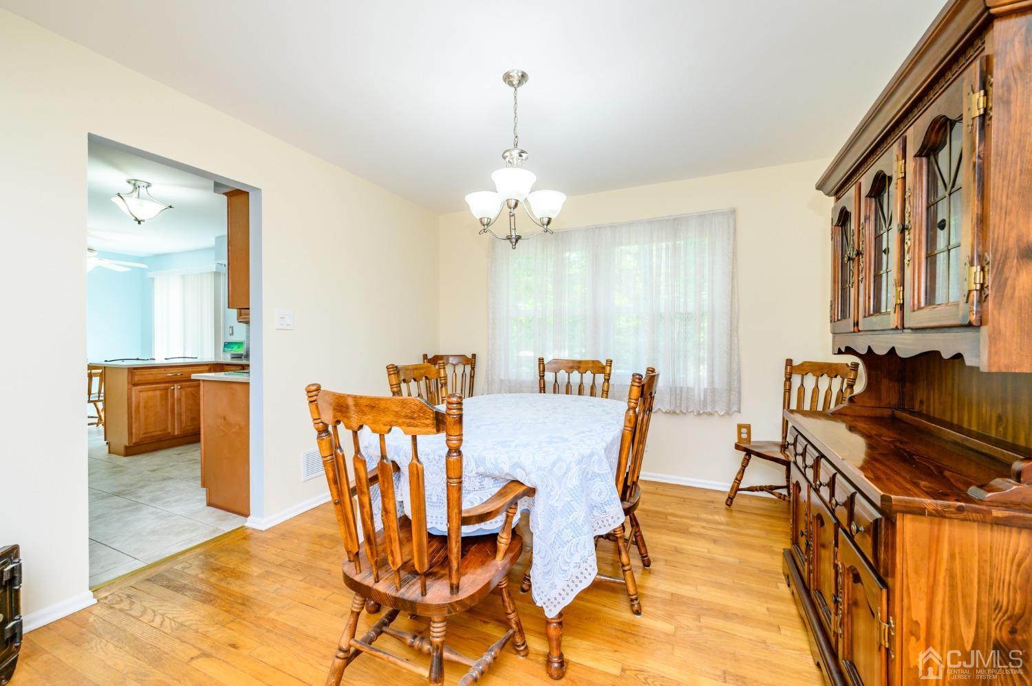40 Fairfield Road Princeton, NJ 08540 - Photo 7 of 46 a dining room with furniture and wooden floor