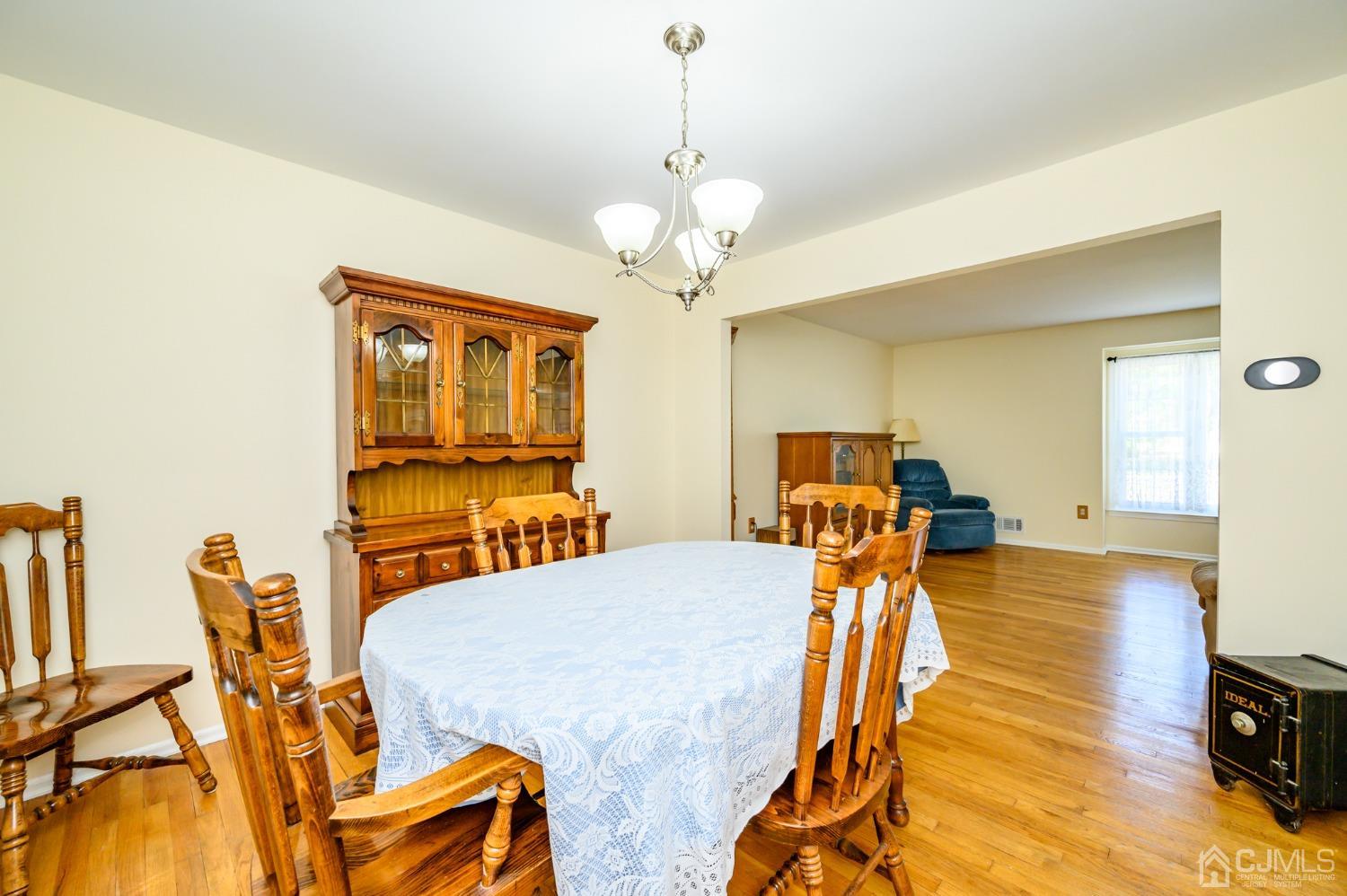 40 Fairfield Road Princeton, NJ 08540 - Photo 9 of 46 a dining room with furniture and wooden floor
