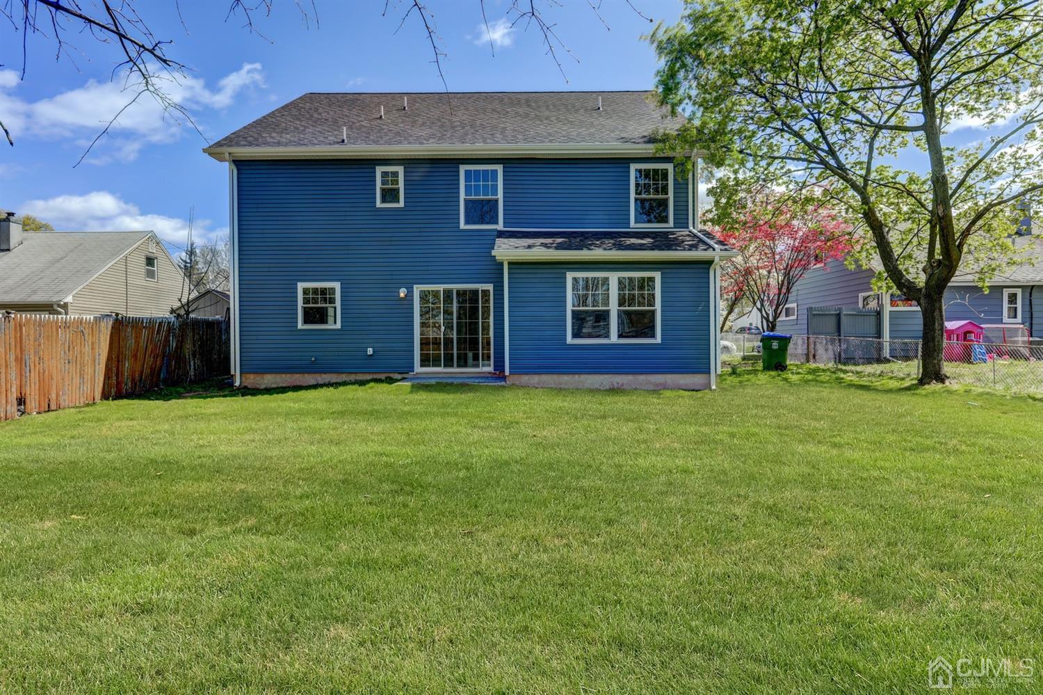 14 Richmond Road Edison, NJ 08817 - Photo 17 of 17 a view of a brick house with a yard