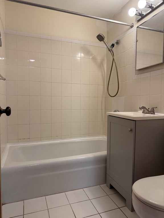 428 Great Road, Unit 6 Acton, MA 01720 - Photo 9 of 9 a bathroom with a shower and a bathtub