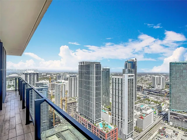 a view of a balcony with city view