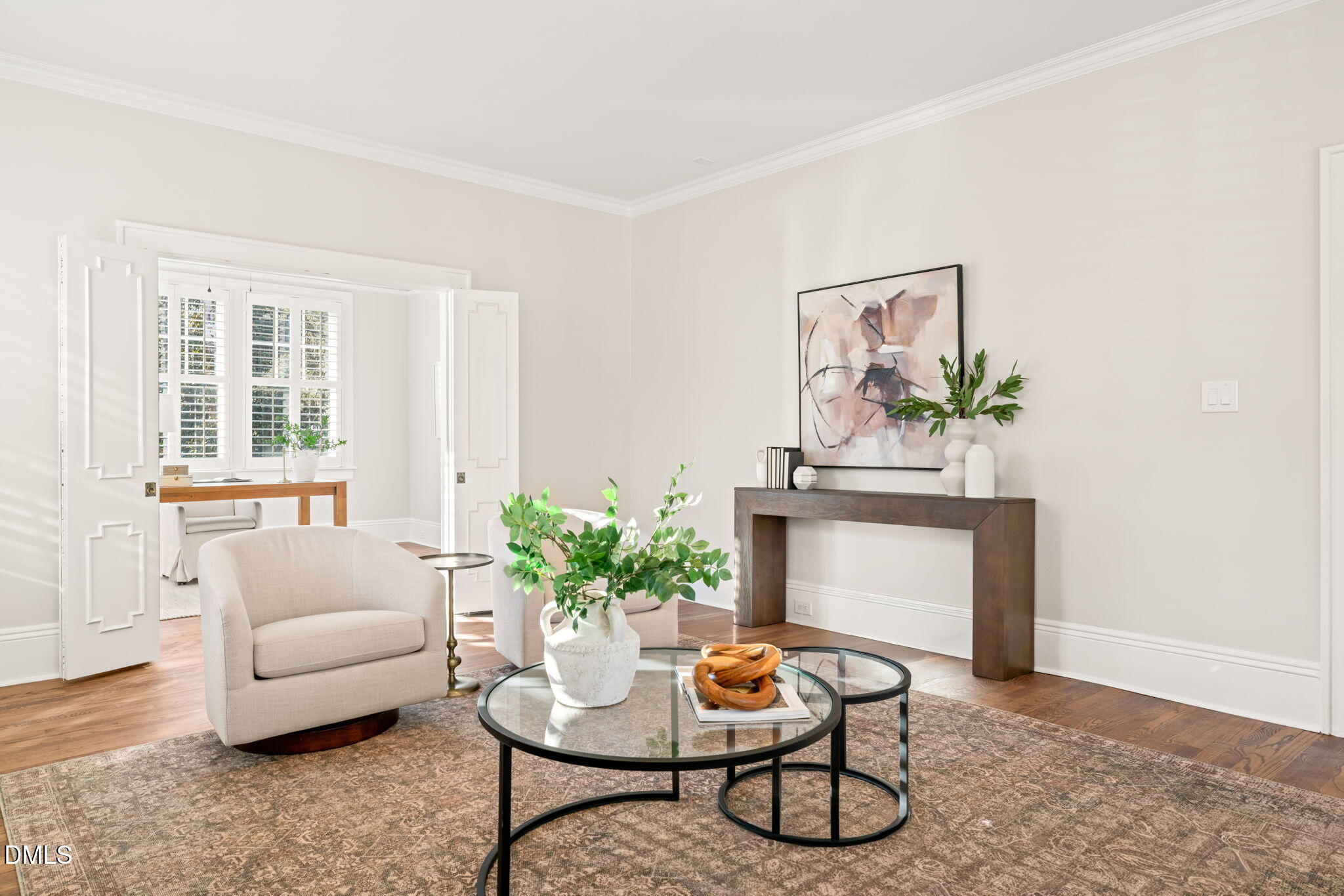 1617 Glenwood Avenue Raleigh, NC 27608 - Photo 10 of 58 a living room with furniture and a potted plant