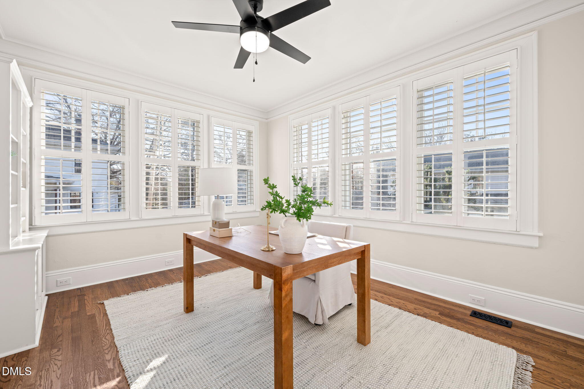 1617 Glenwood Avenue Raleigh, NC 27608 - Photo 13 of 58 a living room with furniture and a window