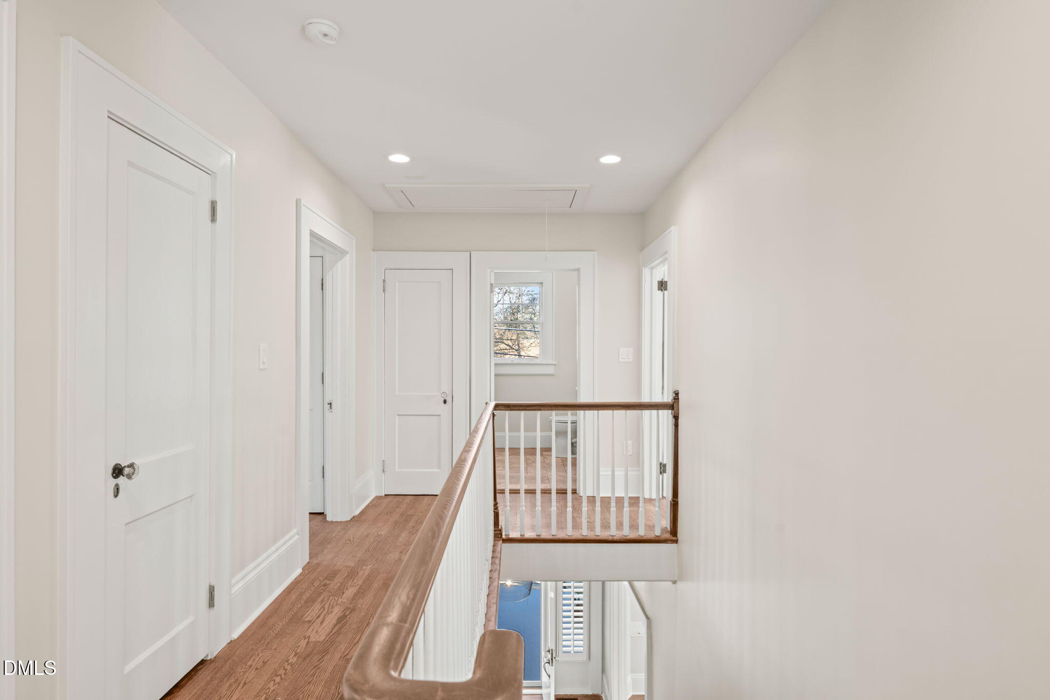 1617 Glenwood Avenue Raleigh, NC 27608 - Photo 28 of 58 a view of staircase with white walls