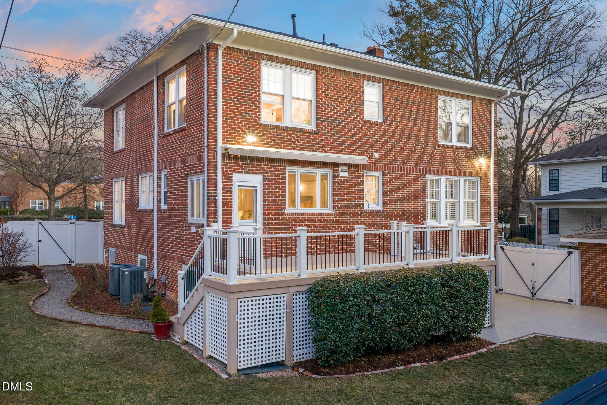 1617 Glenwood Avenue Raleigh, NC 27608 - Photo 54 of 58 a front view of a house with a yard