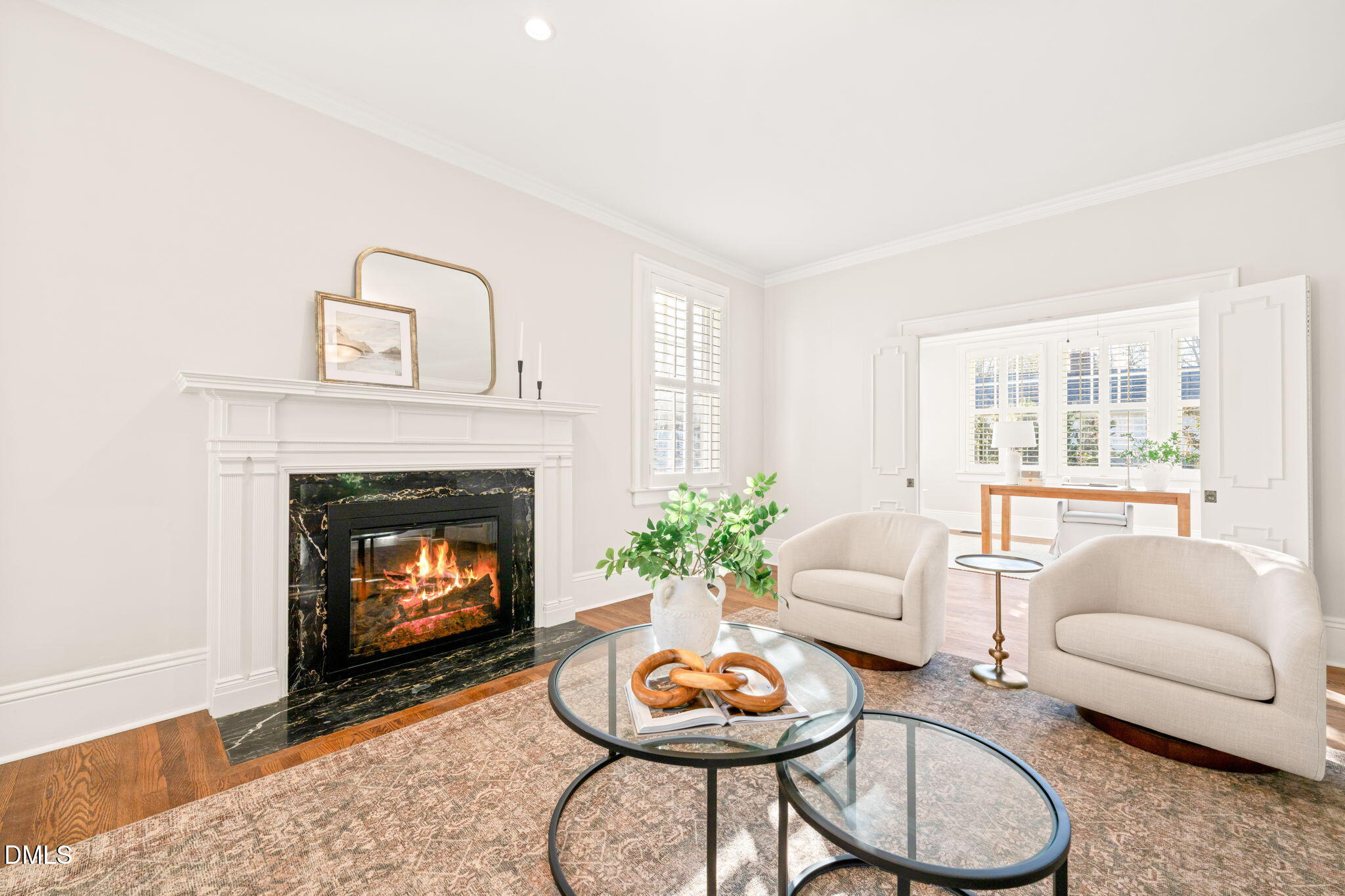 1617 Glenwood Avenue Raleigh, NC 27608 - Photo 9 of 58 a living room with furniture a fireplace and a large window