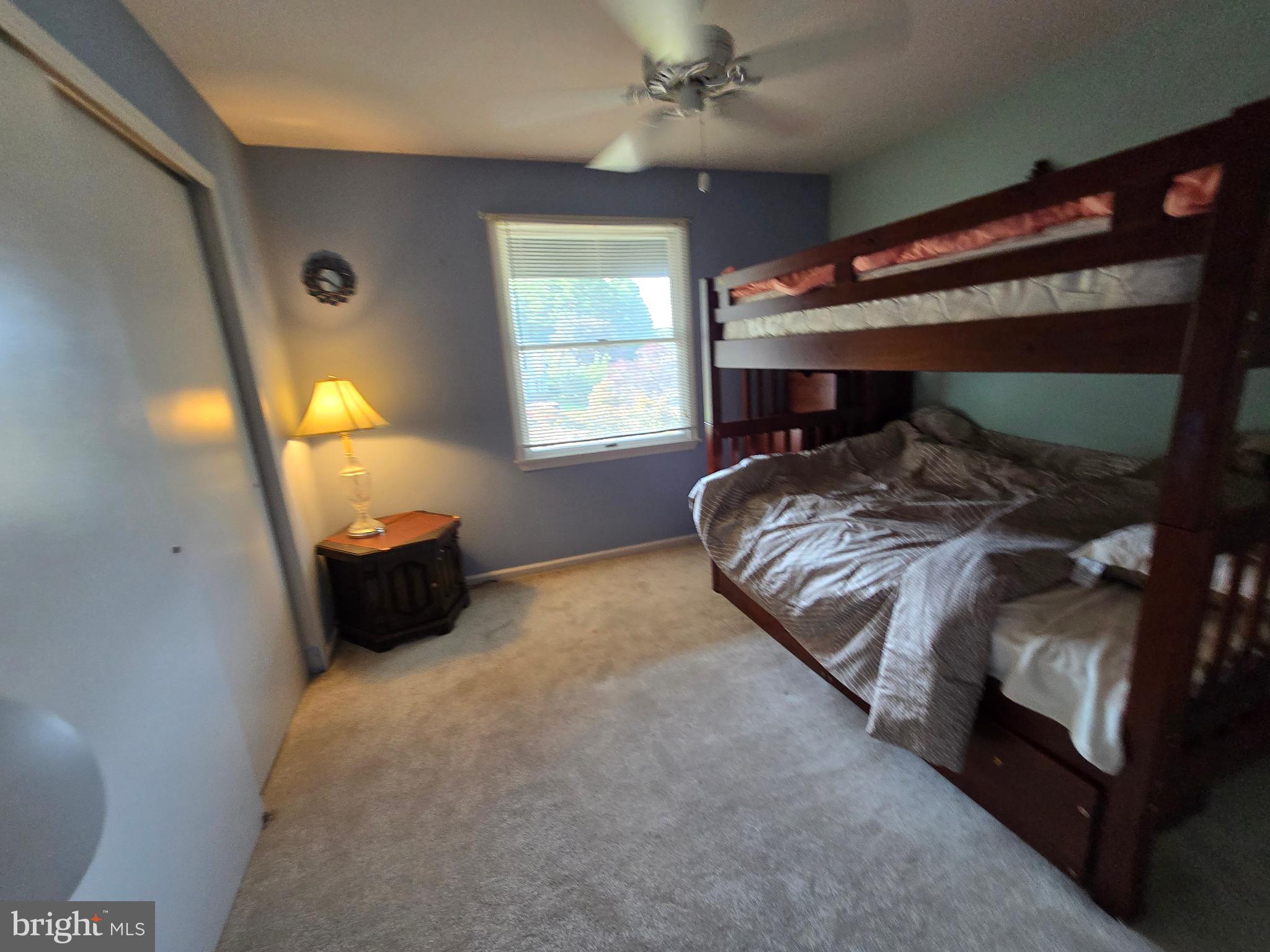 1 Radcliff Court Sicklerville, NJ 08081 - Photo 21 of 40 a bed sitting in a bedroom next to a window