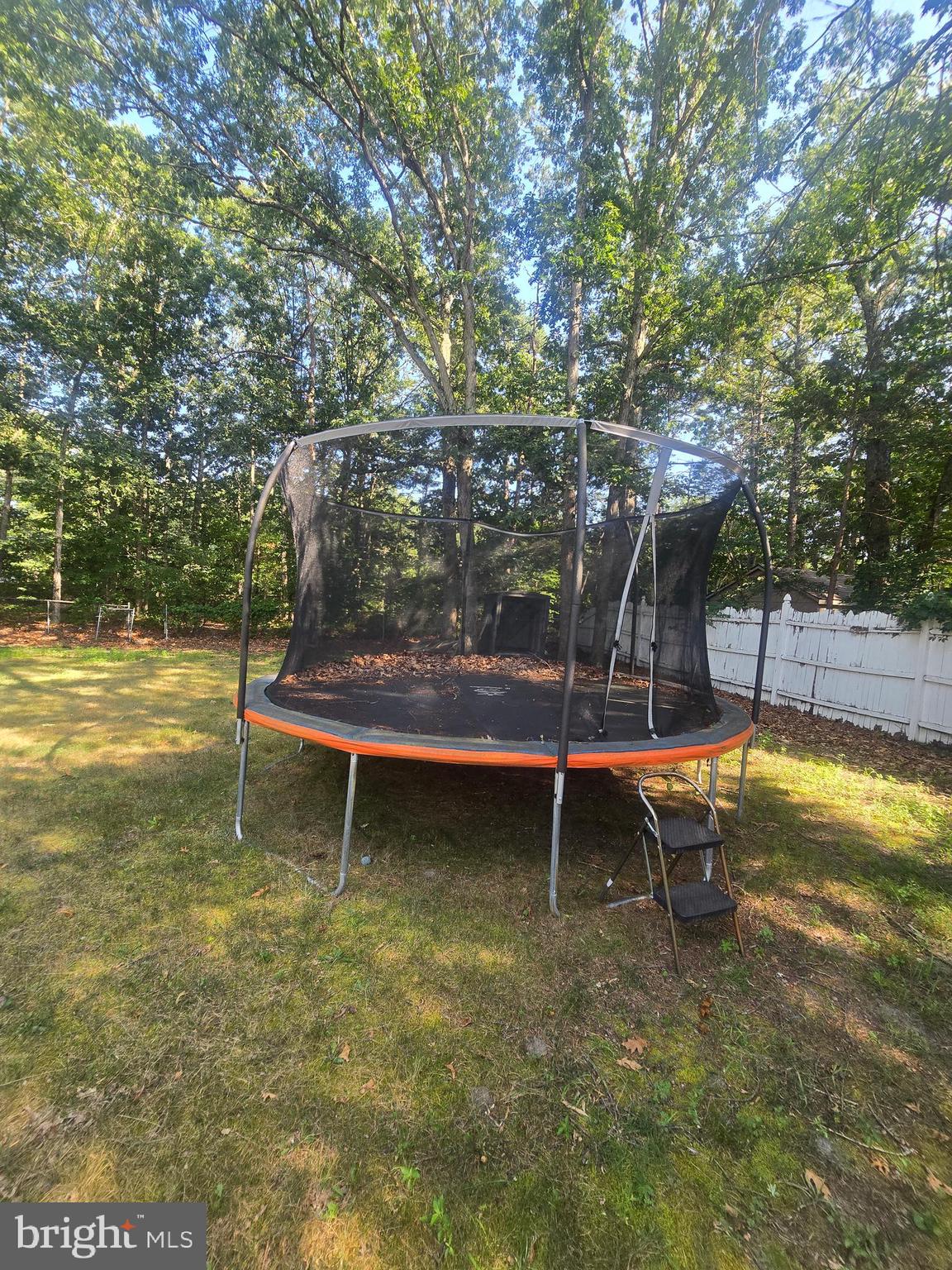 1 Radcliff Court Sicklerville, NJ 08081 - Photo 37 of 40 a view of a swimming pool with a bench in the patio