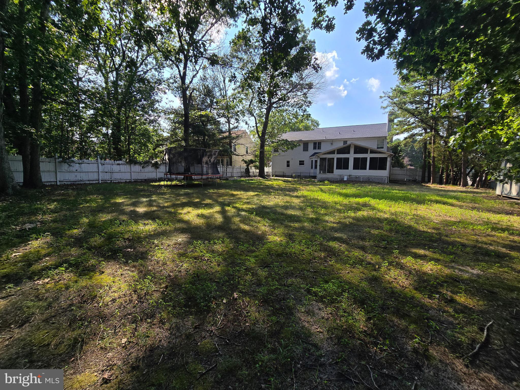1 Radcliff Court Sicklerville, NJ 08081 - Photo 5 of 40 a view of a big house with a big yard and large trees