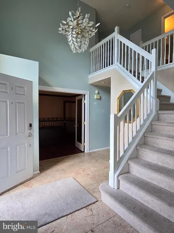 a view of entryway with a front door