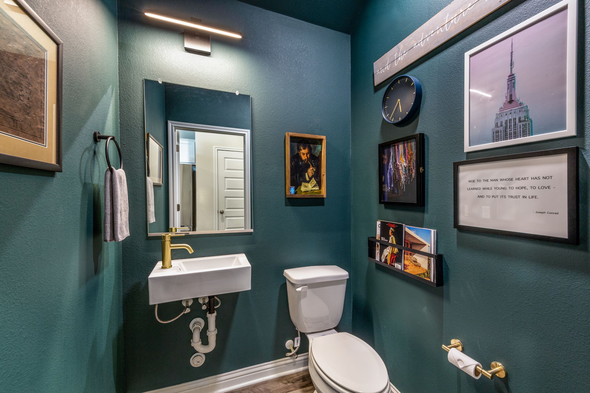 7812 Moody Bend, Unit 38 Austin, TX 78744 - Photo 15 of 39 a bathroom with a toilet a sink and mirror