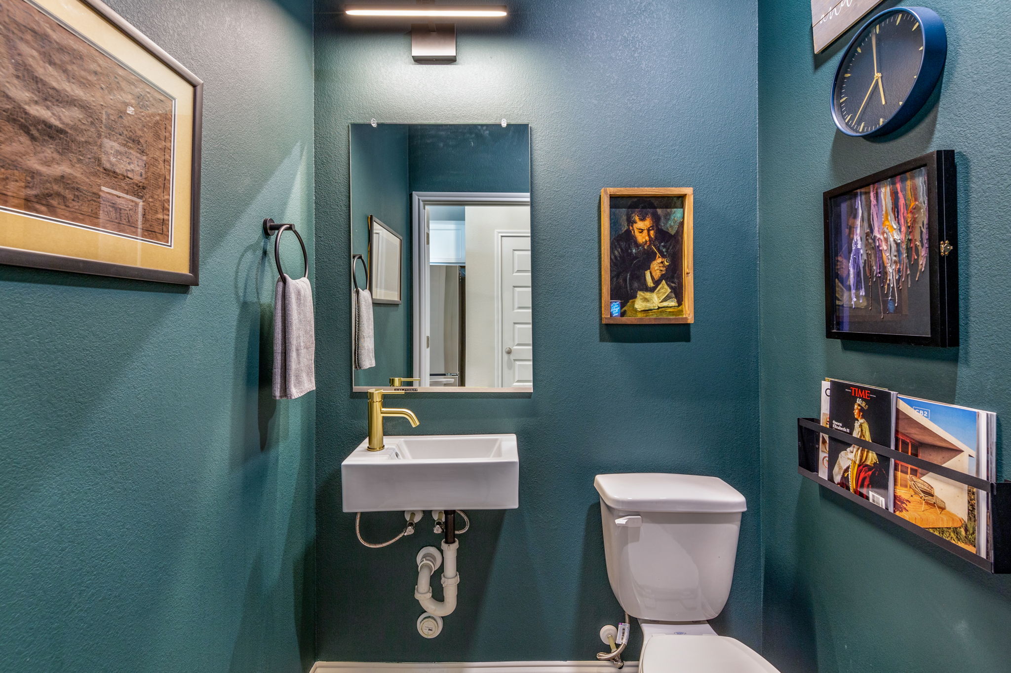 7812 Moody Bend, Unit 38 Austin, TX 78744 - Photo 16 of 39 a bathroom with a toilet a sink and a mirror