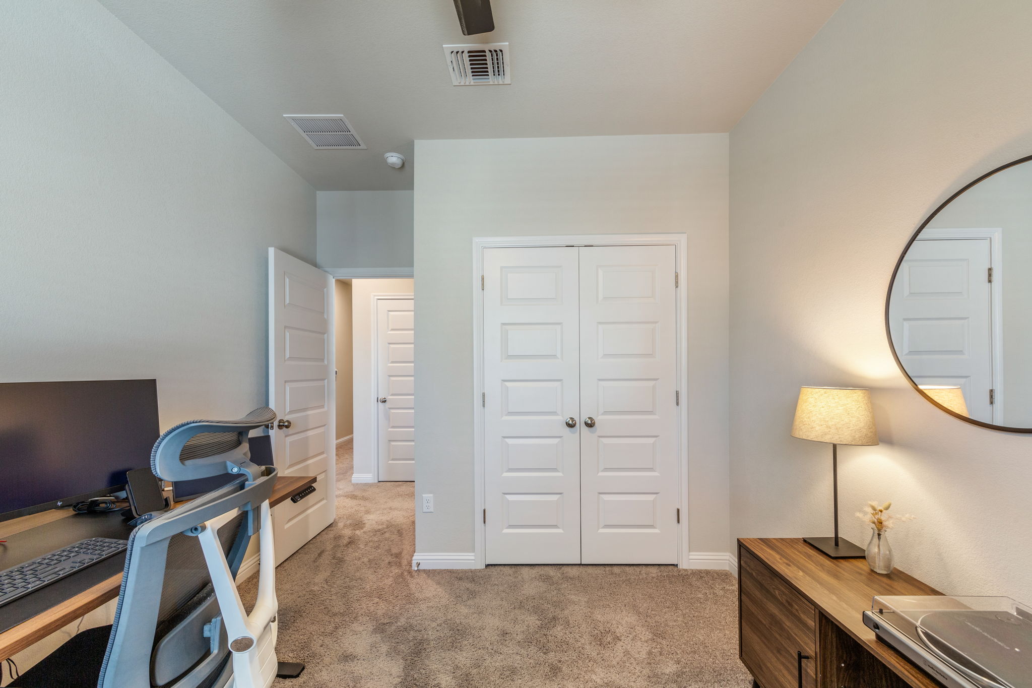 7812 Moody Bend, Unit 38 Austin, TX 78744 - Photo 27 of 39 a view of a workspace room with gym equipment