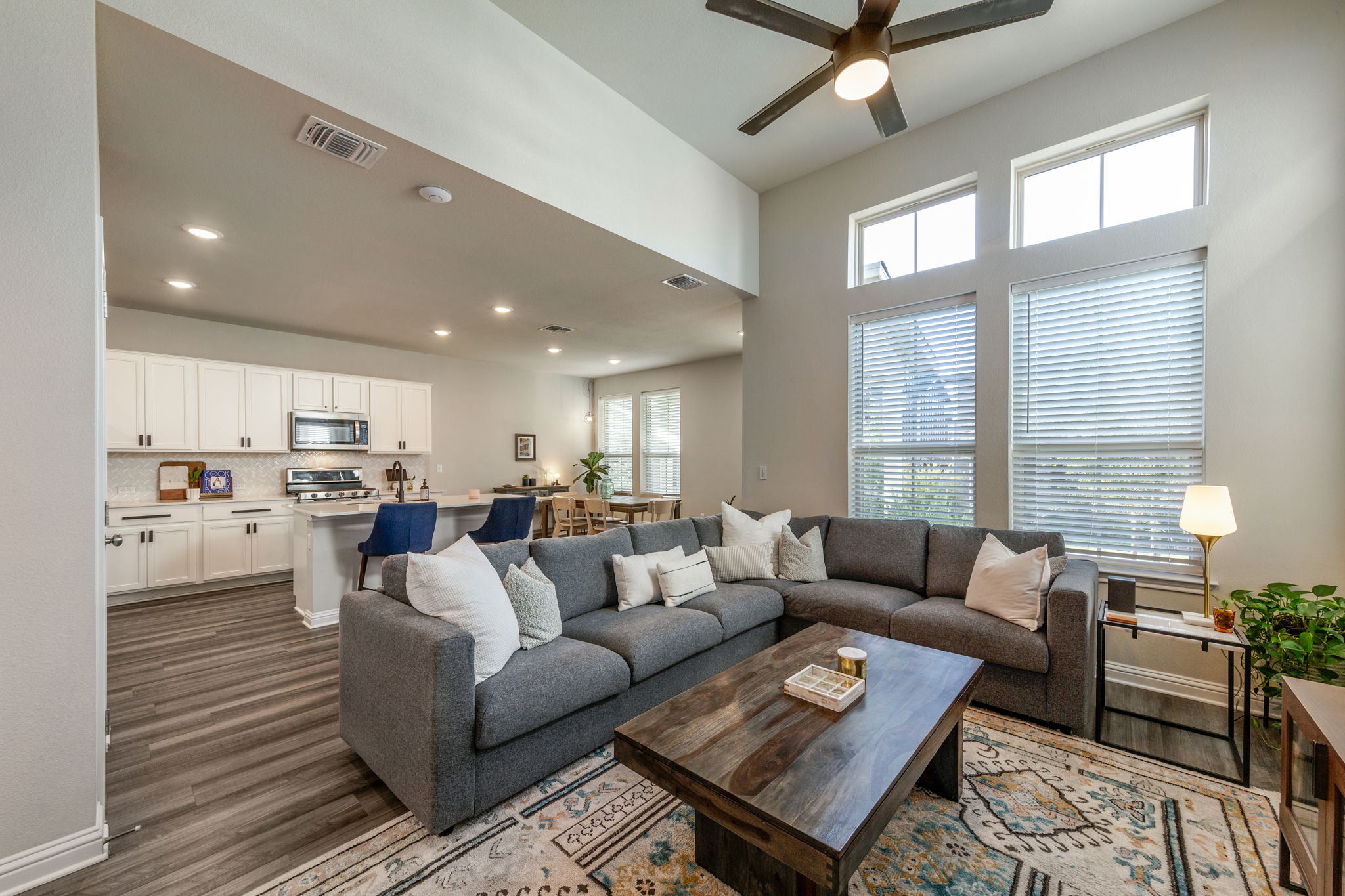 7812 Moody Bend, Unit 38 Austin, TX 78744 - Photo 3 of 39 a living room with furniture and a large window