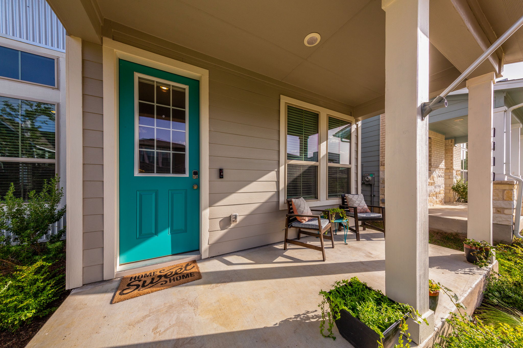 7812 Moody Bend, Unit 38 Austin, TX 78744 - Photo 31 of 39 a house view with a outdoor space