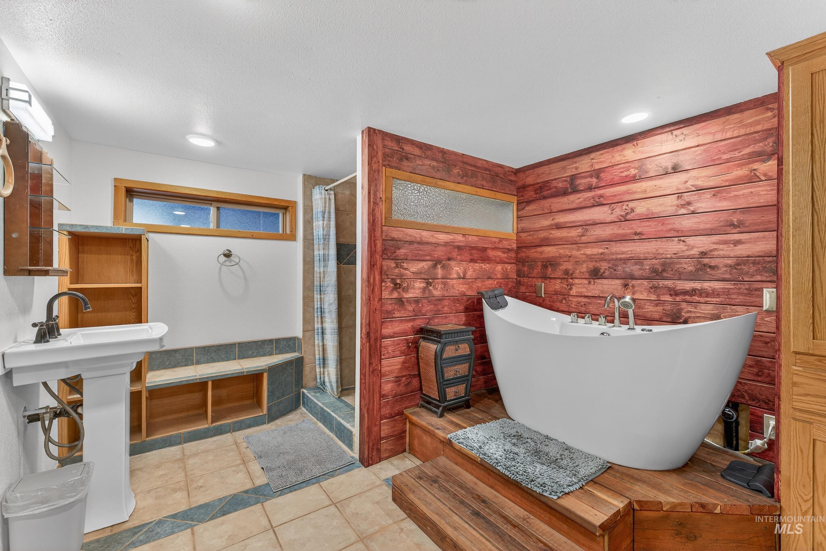 1352 South Main Street Riggins, ID 83549 - Photo 31 of 50 Bathroom with light tile patterned flooring, a shower stall, a soaking tub, and recessed lighting